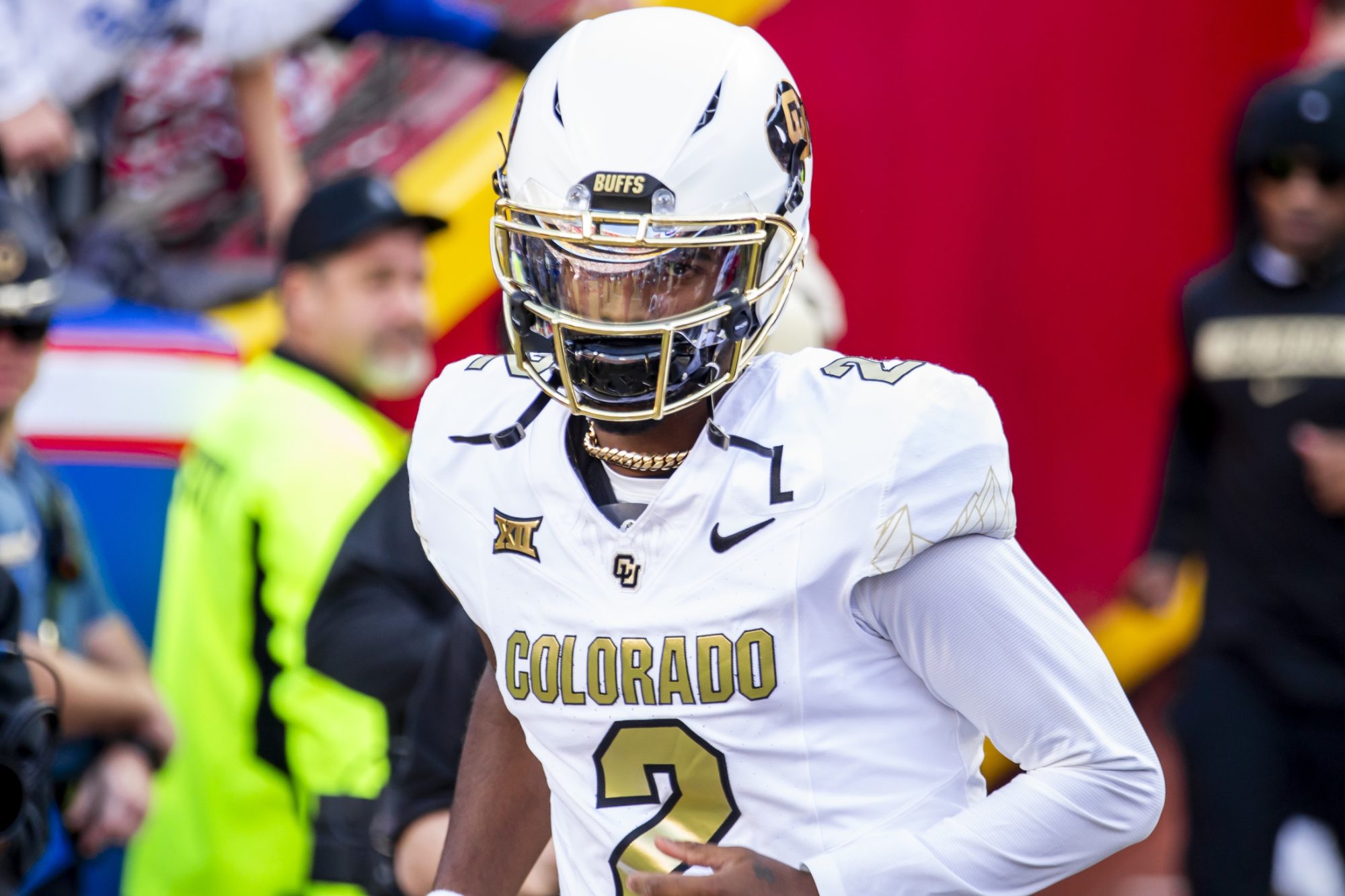 Las Vegas Raiders prospect and Colorado quarterback Shedeur Sanders (2) jogs onto the field during the game against the Kansas Jayhawks at GEHA Field at Arrowhead Stadium.